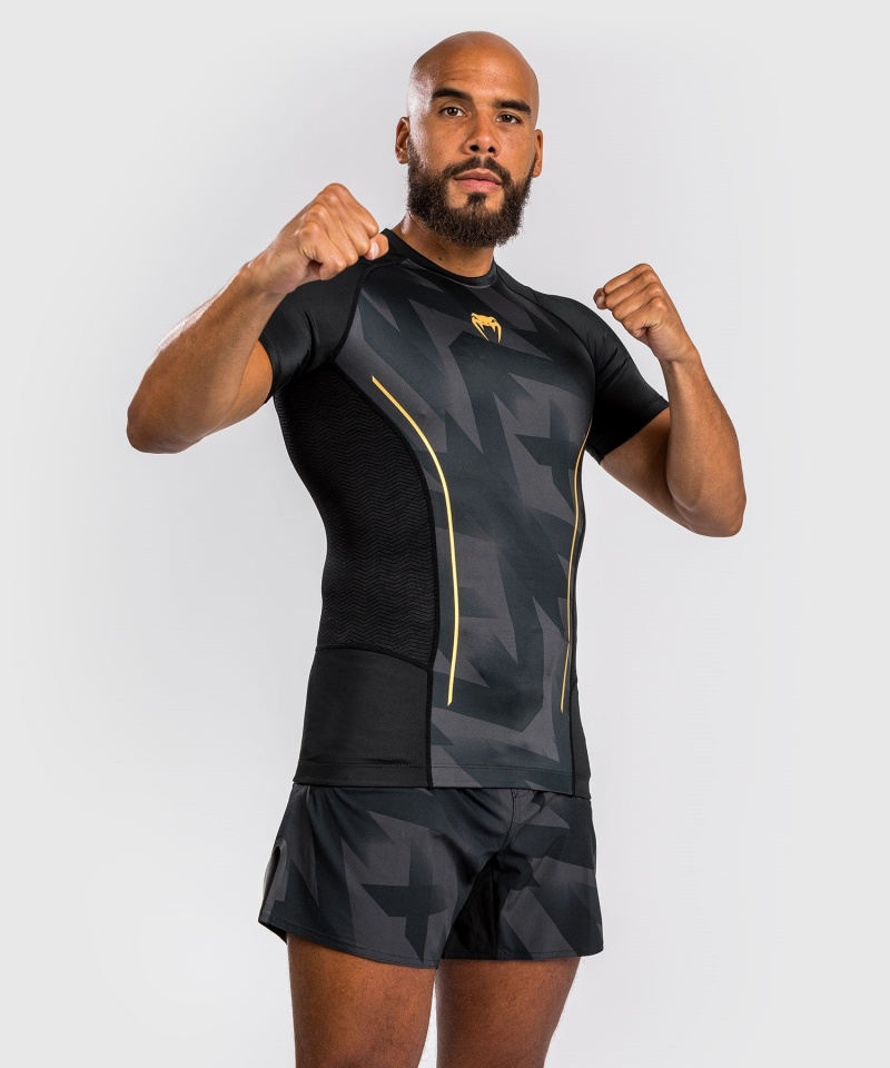 Venum Razor Lyhyt Sleeves Miesten MMA Rashguard Mustat Kultaiset | 79024-ATYN | Suomi