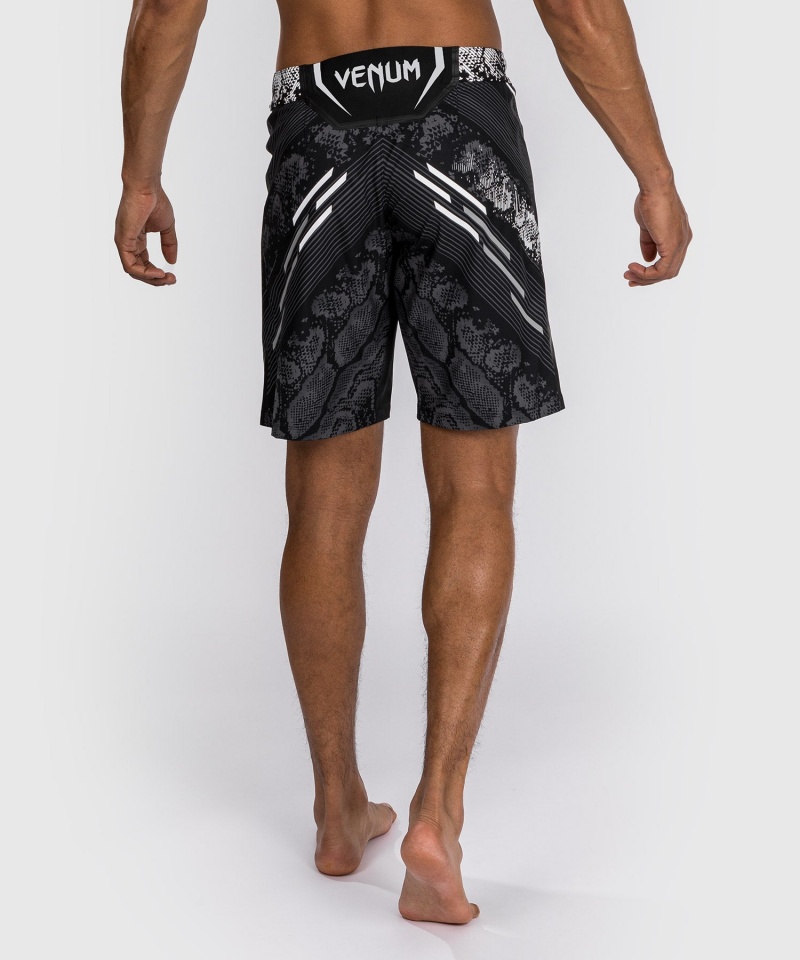 Venum UFC Adrenaline by Venum Authentic Fight Night Long Fit Miesten Nyrkkeilyshortsit Mustat | 75431-HYAT | Suomi