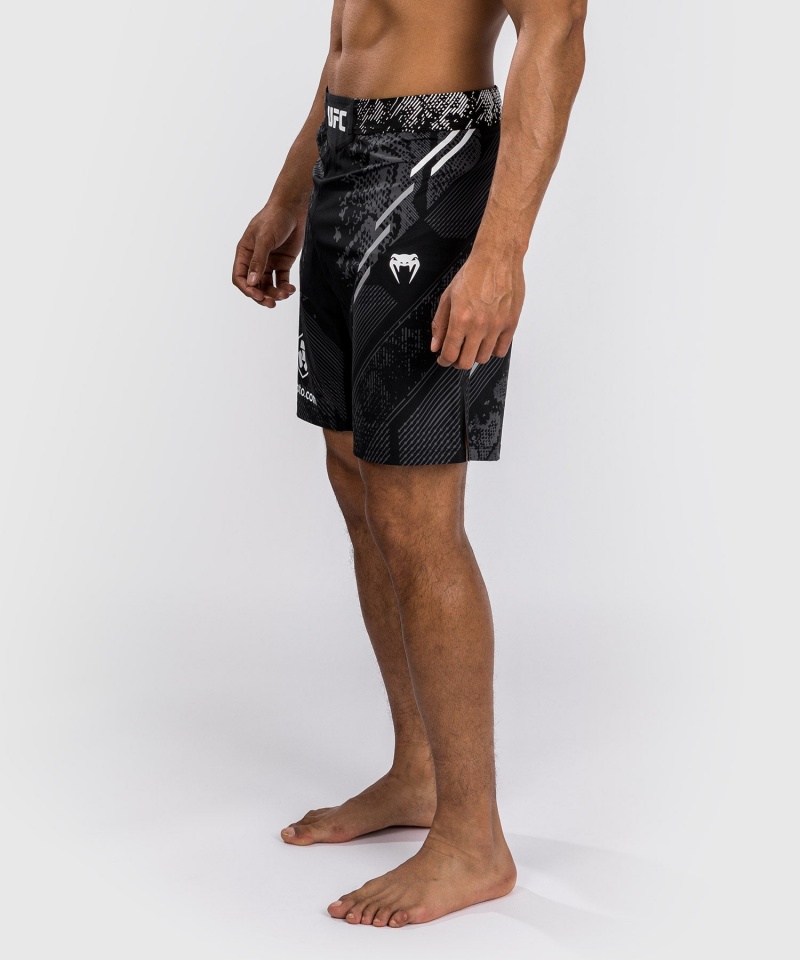 Venum UFC Adrenaline by Venum Authentic Fight Night Long Fit Miesten Nyrkkeilyshortsit Mustat | 75431-HYAT | Suomi