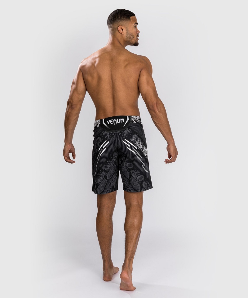 Venum UFC Adrenaline by Venum Authentic Fight Night Long Fit Miesten Nyrkkeilyshortsit Mustat | 75431-HYAT | Suomi