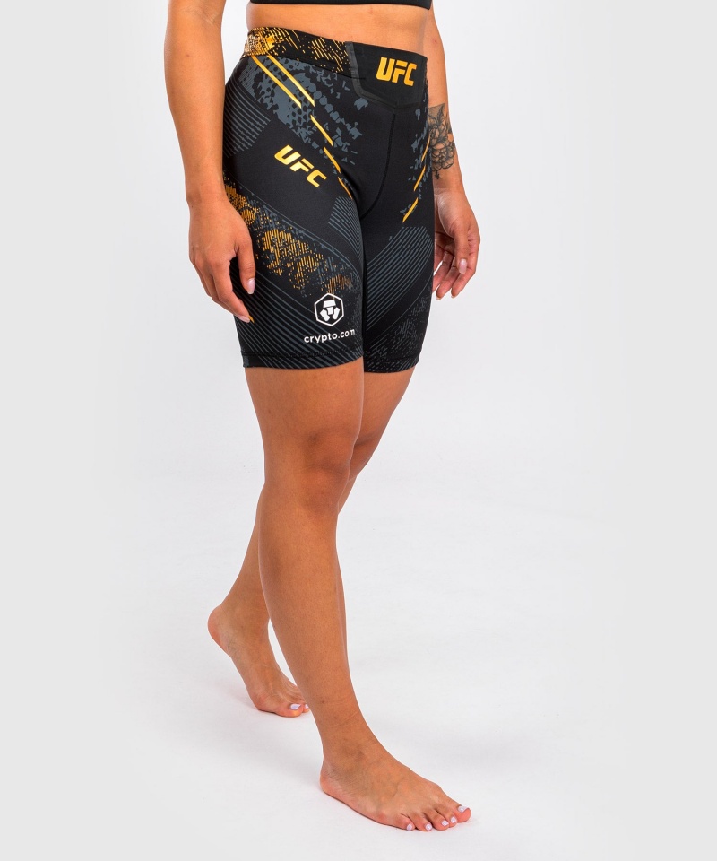 Venum UFC Adrenaline by Venum Authentic Fight Night Vale Long Fit Tudo Naisten Shortsit Kultaiset | 43196-JALP | Suomi