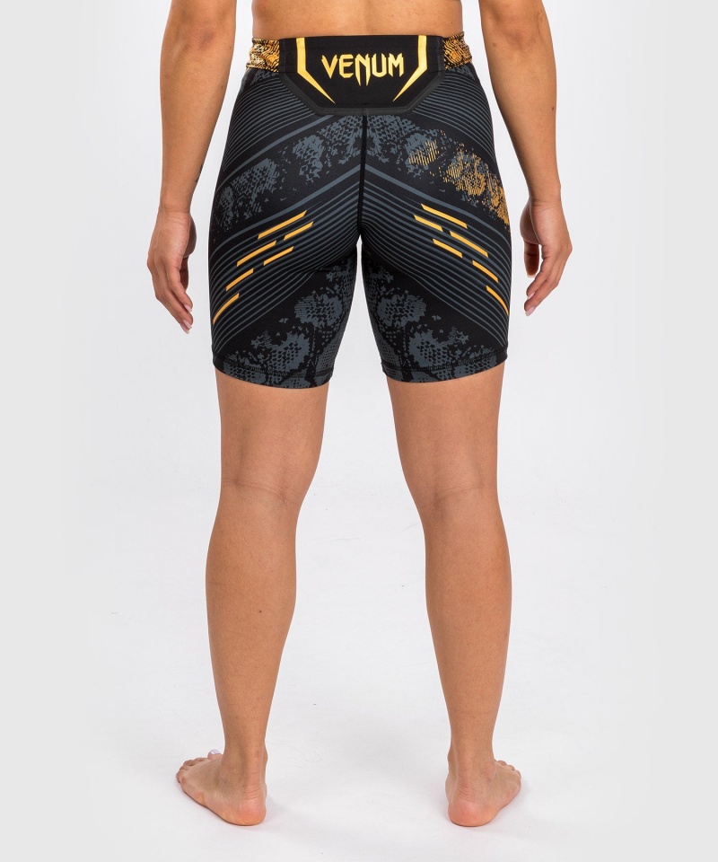 Venum UFC Adrenaline by Venum Authentic Fight Night Vale Long Fit Tudo Naisten Shortsit Kultaiset | 43196-JALP | Suomi