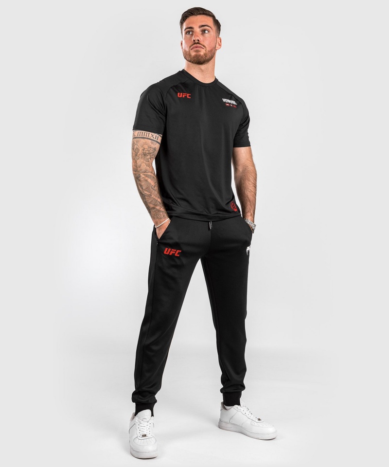 Venum UFC Adrenaline by Venum Fight Week Performance Miesten Jogger Housut Mustat | 46503-UWFM | Suomi