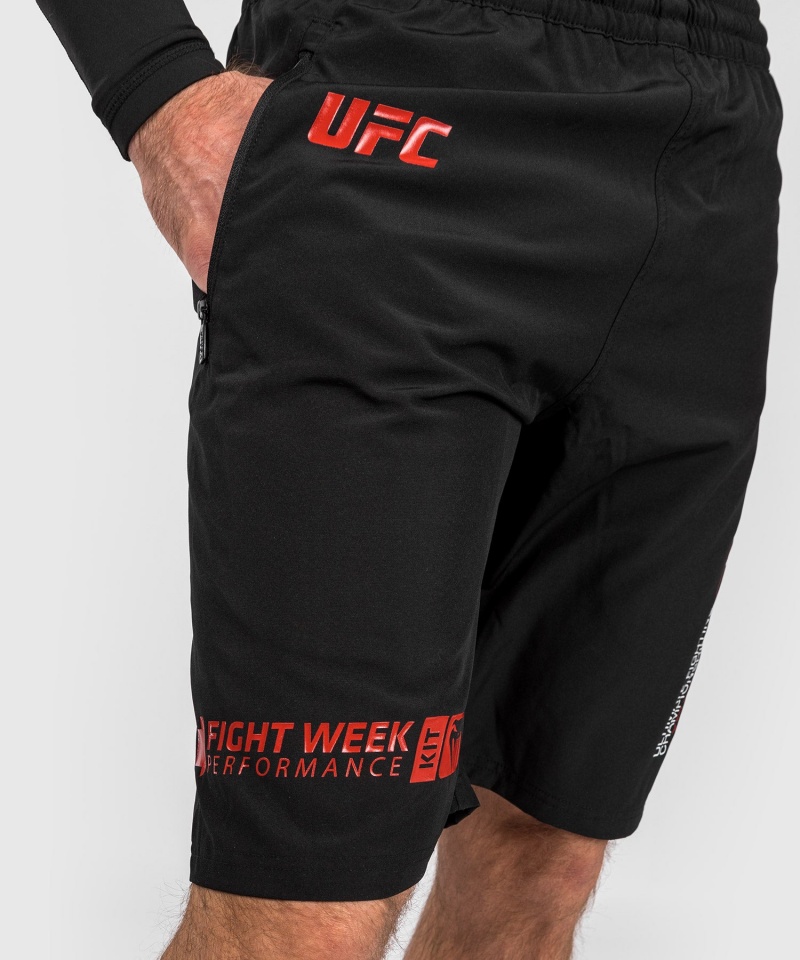 Venum UFC Adrenaline by Venum Fight Week Performance Miesten Shortsit Mustat | 95602-MUNF | Suomi