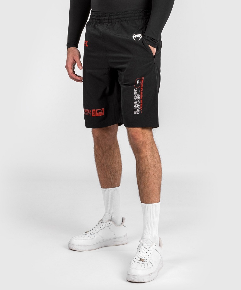 Venum UFC Adrenaline by Venum Fight Week Performance Miesten Shortsit Mustat | 95602-MUNF | Suomi