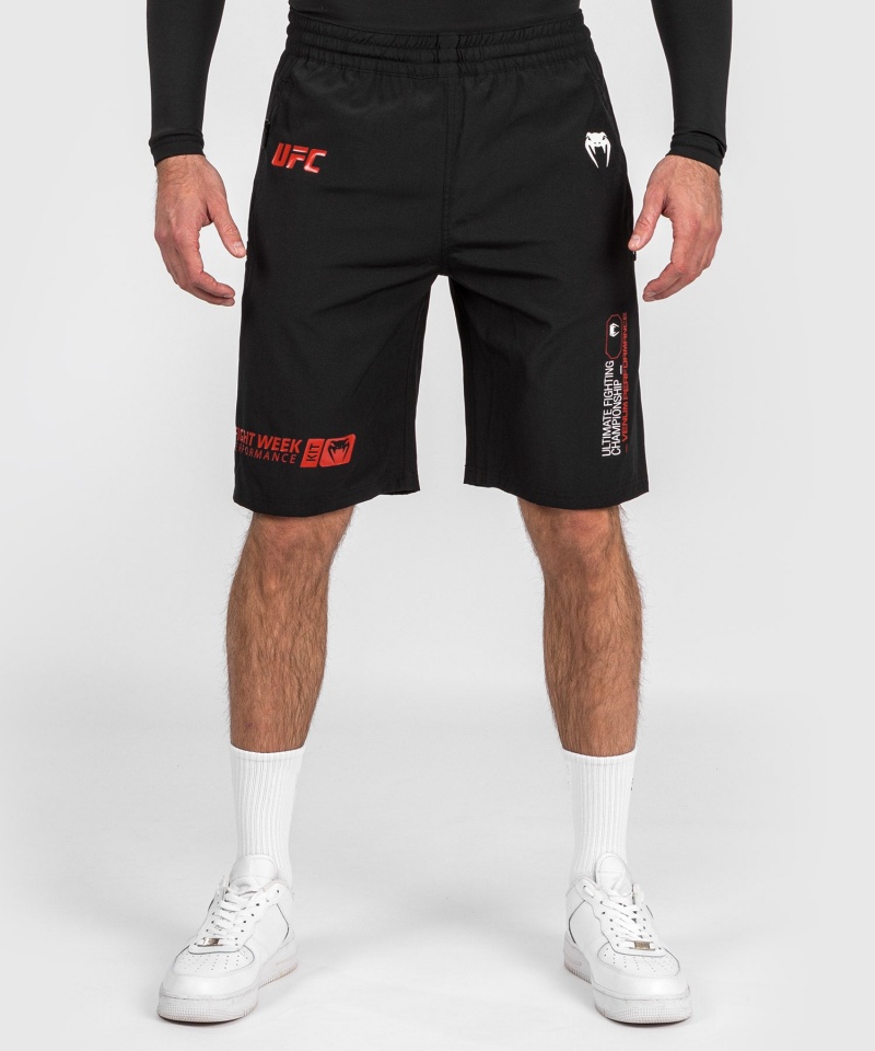 Venum UFC Adrenaline by Venum Fight Week Performance Miesten Shortsit Mustat | 95602-MUNF | Suomi